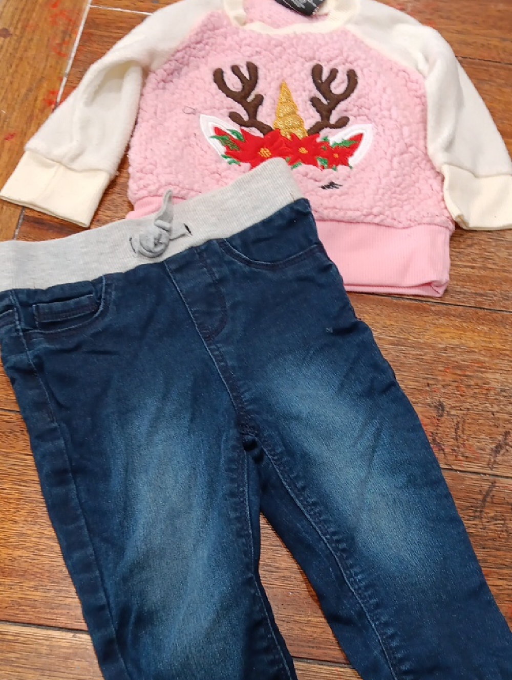 Pink Sherpa Unicorn Sweatshirt with Cream Sleeves And Navy Pants